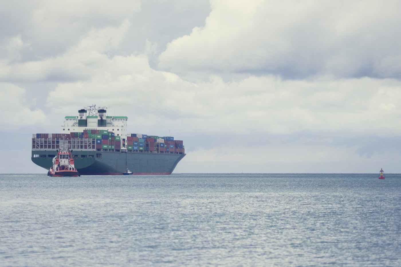 Container vessel loading at a commercial port terminal